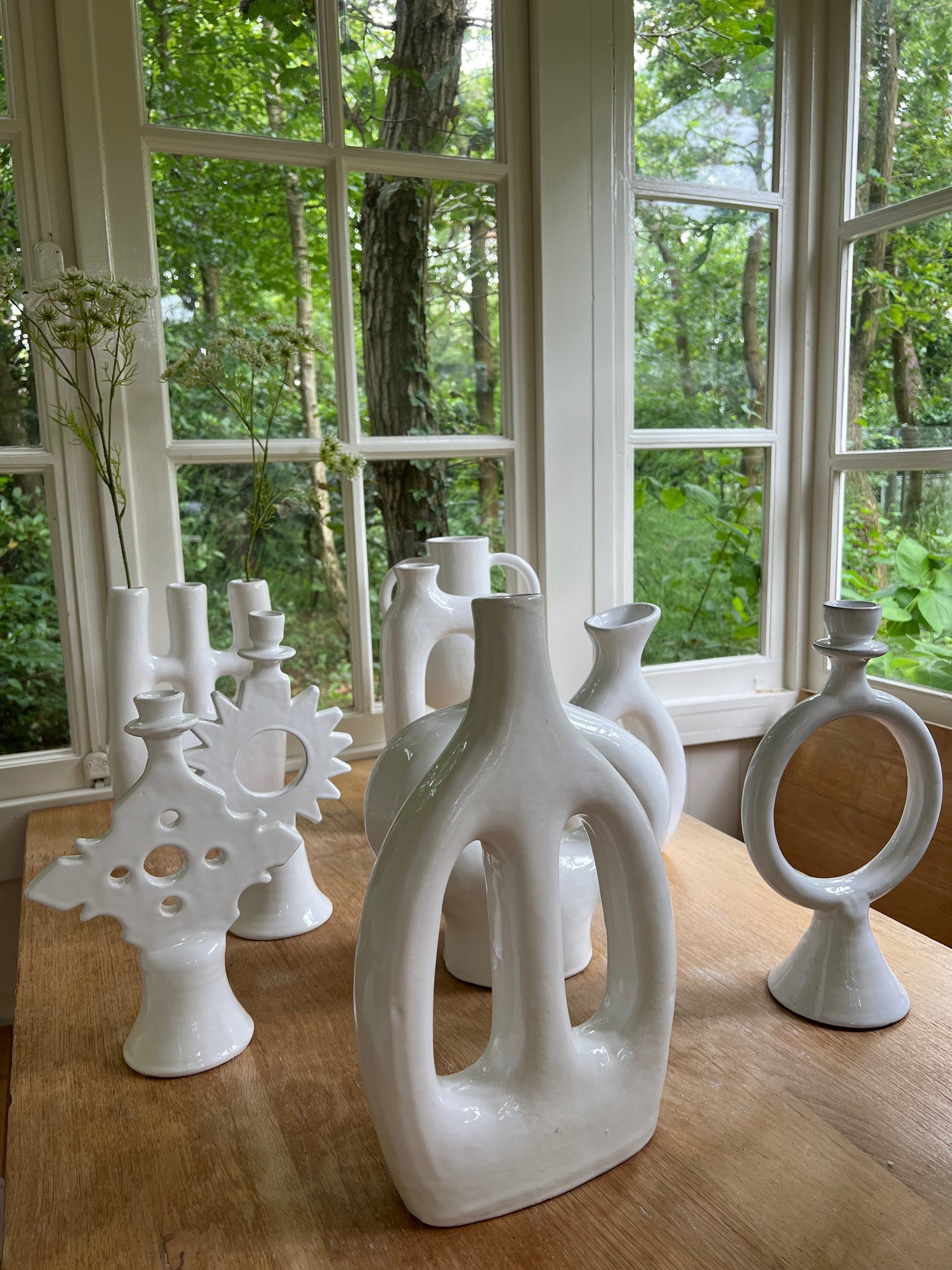 Tamegroute white glazed vases - 10 different organic shaped.