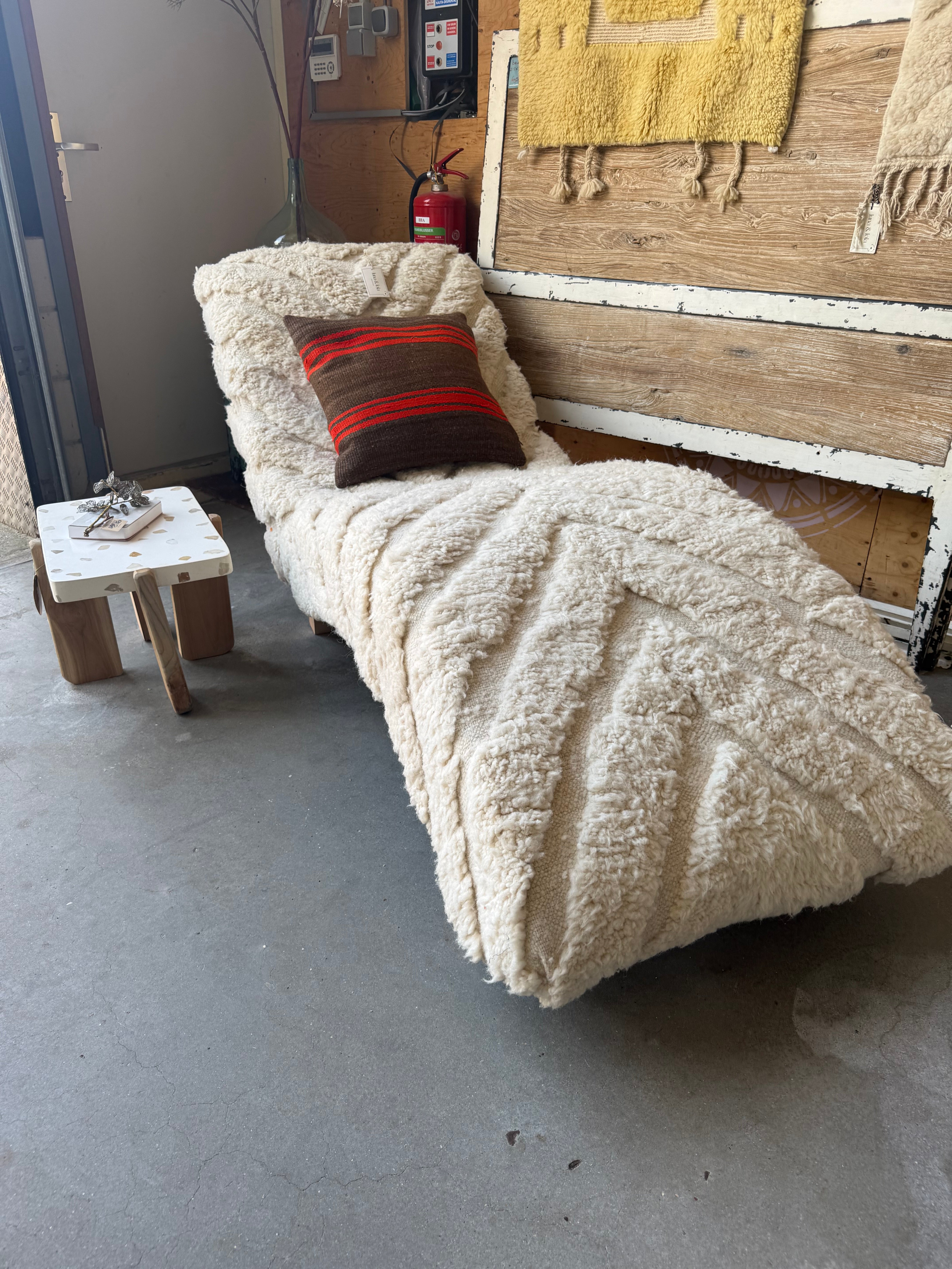 Chaise longue van Berber kleed