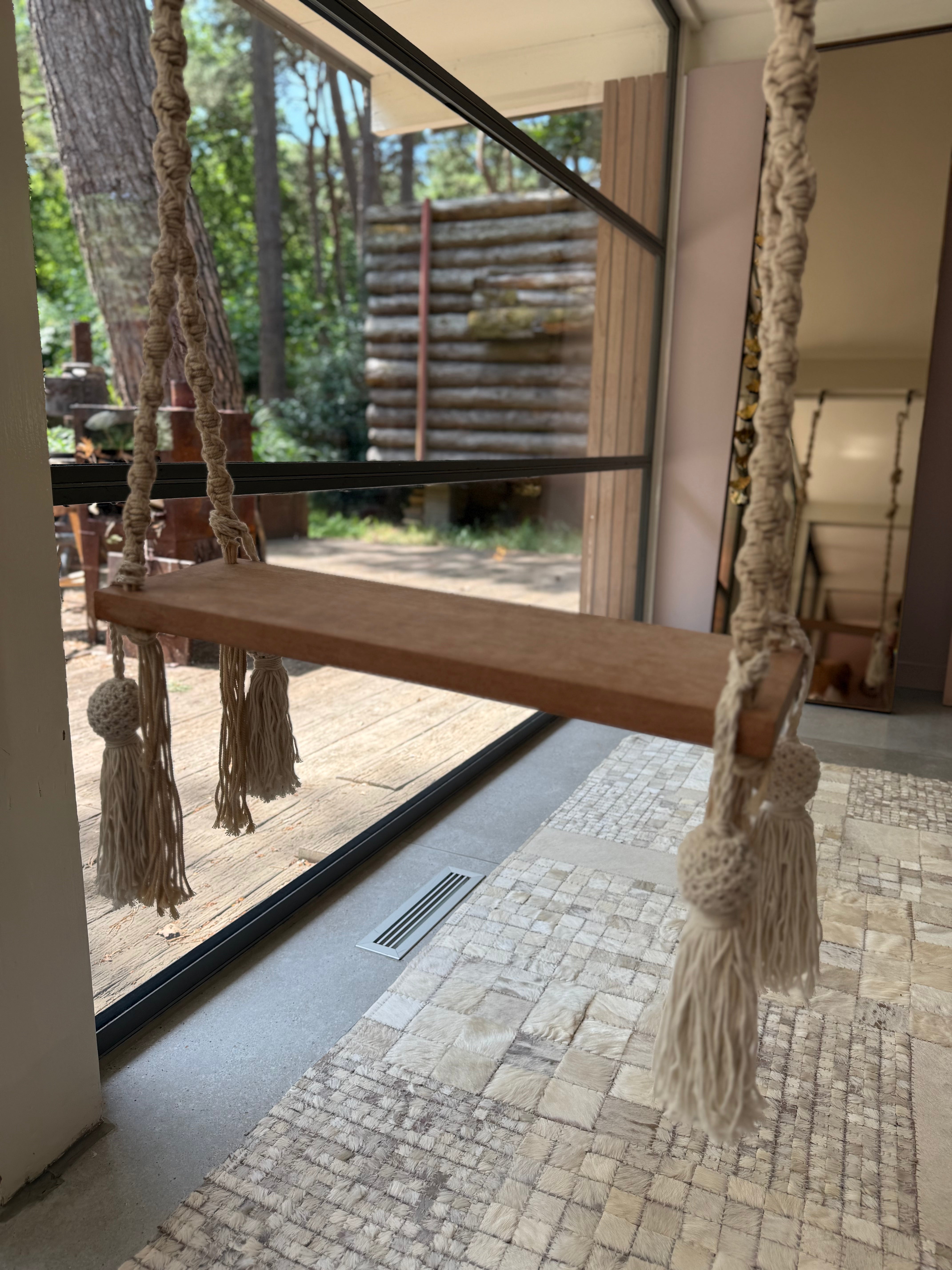 Swing with crochetwork decoration
