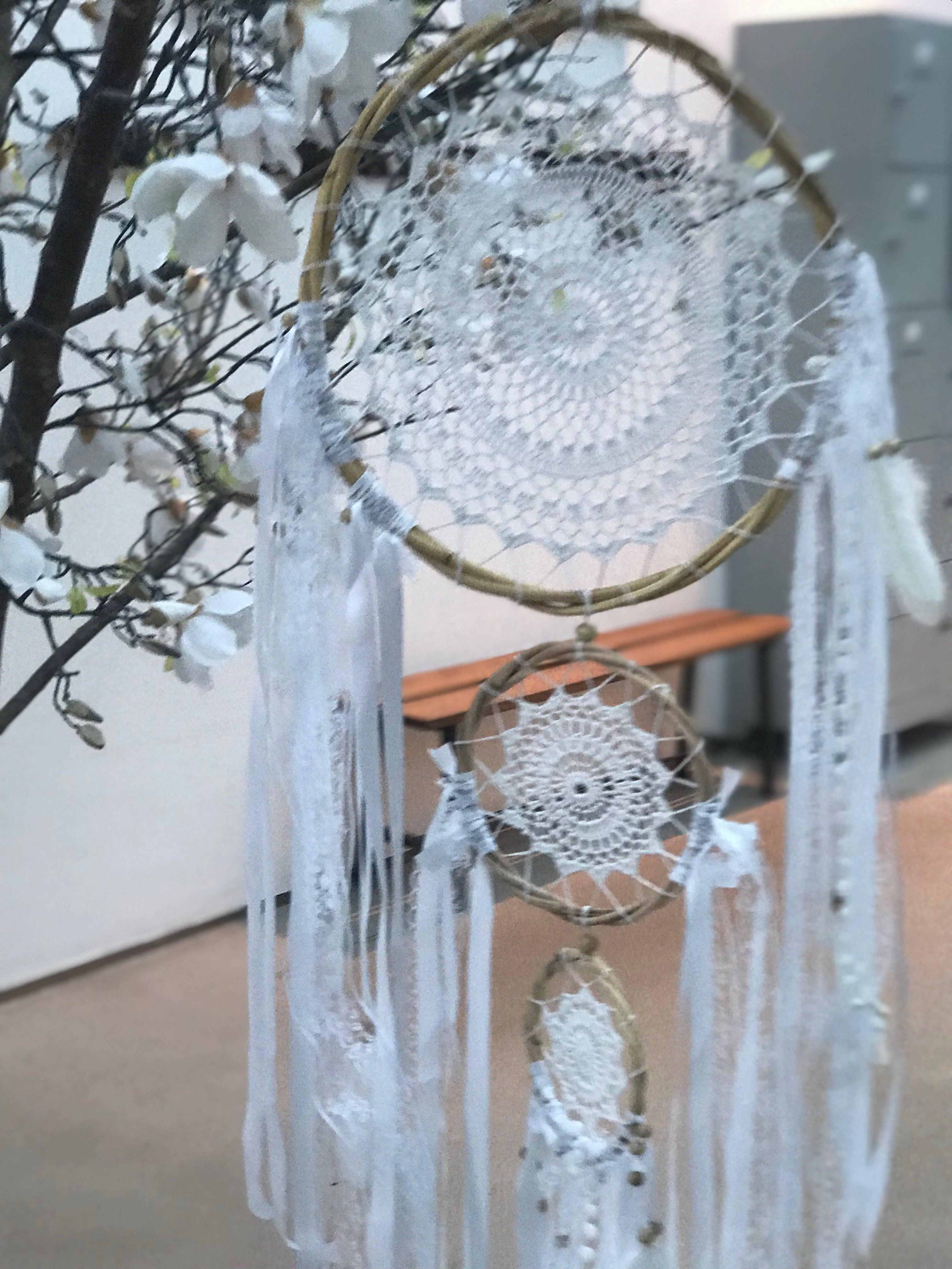 White handmade dreamcatcher trio with lace, ribbons, and pompom accents, 42 cm diameter.